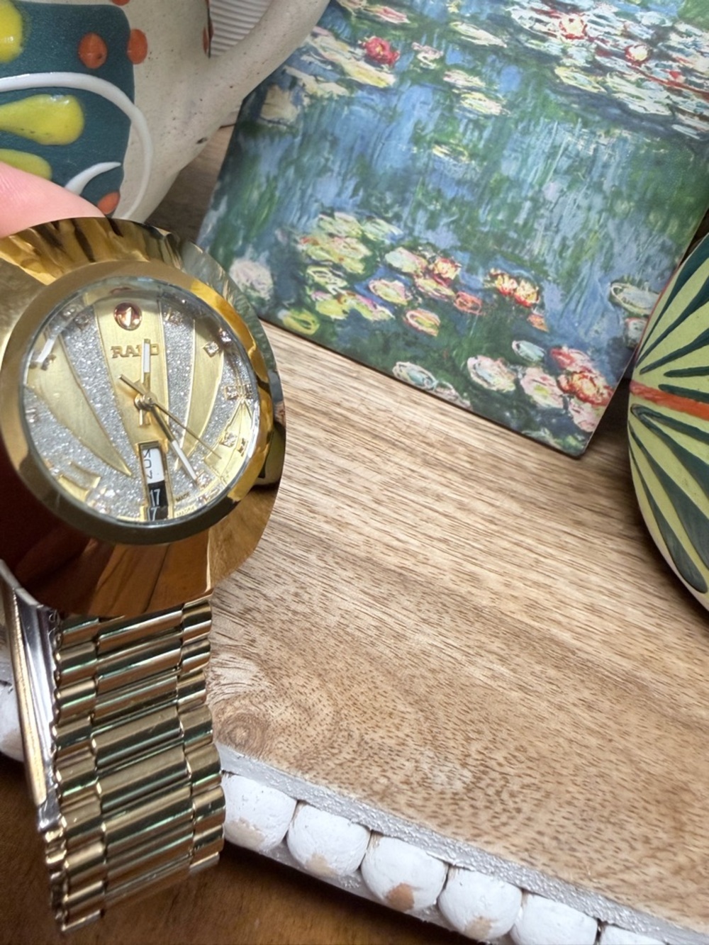 Rado Gold-Tone Women’s Watch with Metallic Gold Dial and Bracelet